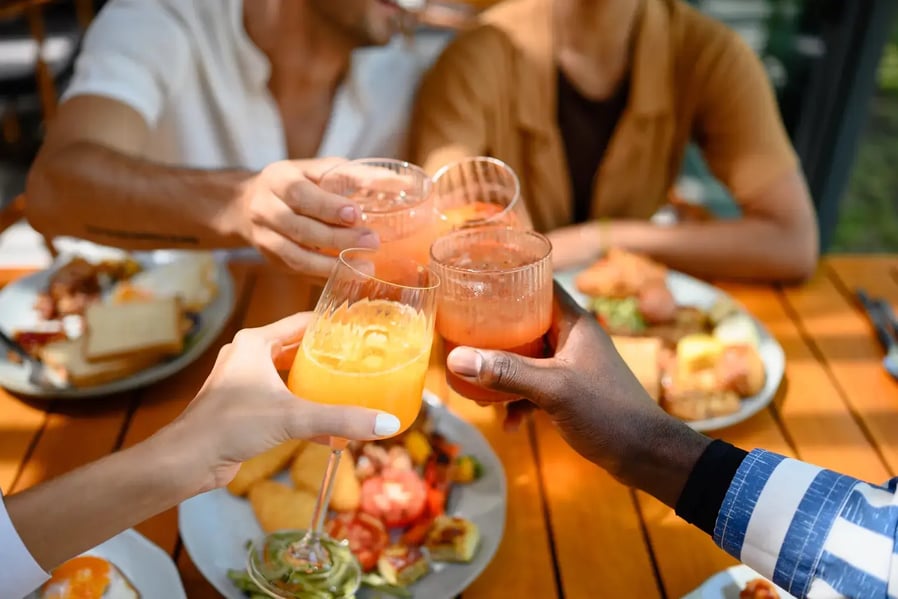 Friends at brunch table - Image by Dorde Krstic / Shutterstock.com